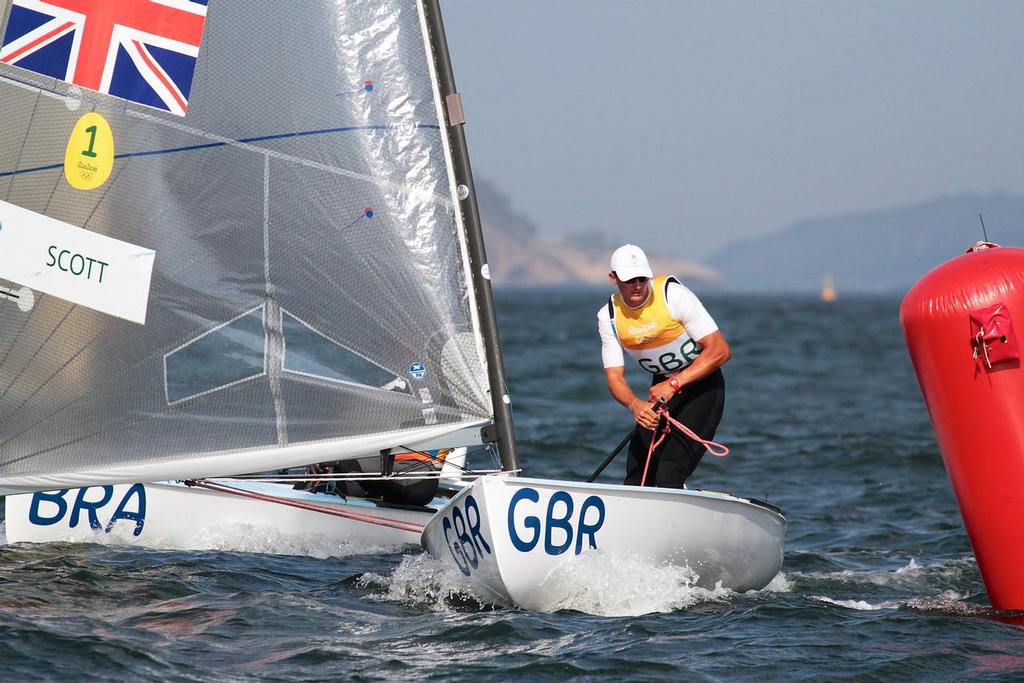 Finn Gold Medalist -  Giles Scott(GBR) rounds the leeward mark in the Finn class medal race © Richard Gladwell www.photosport.co.nz